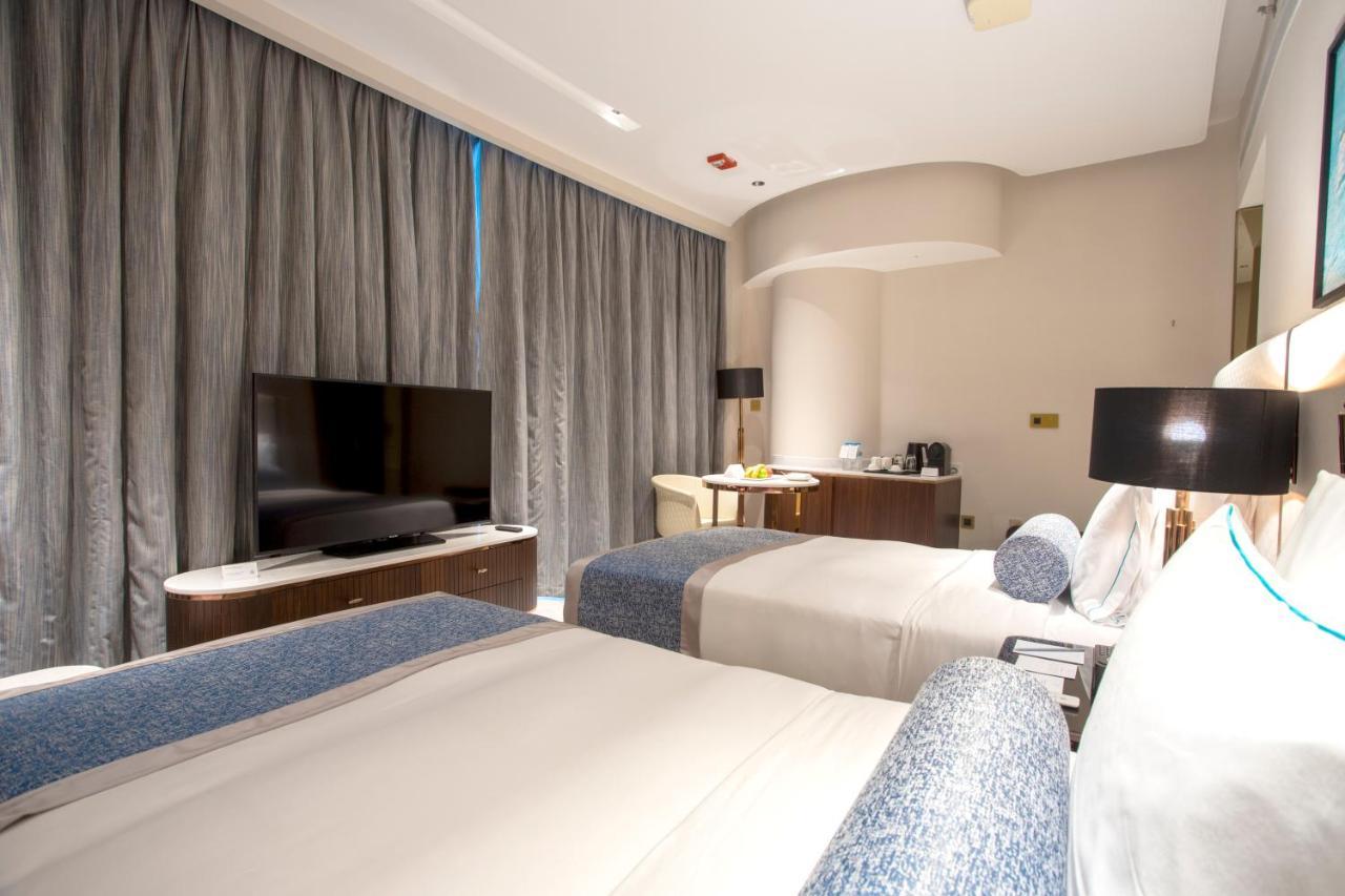 Century Marina Hotel - Lusail Kültér fotó Deluxe Room