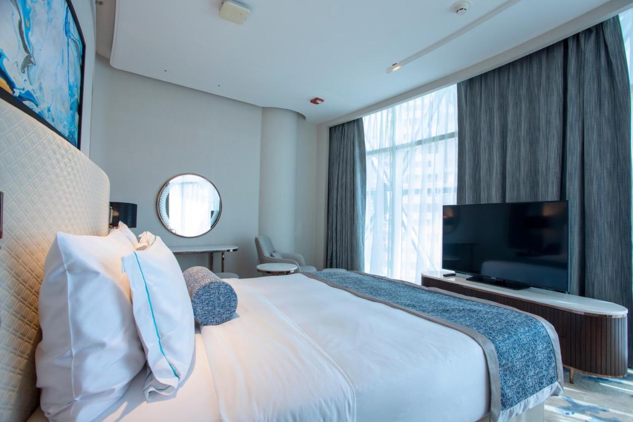 Century Marina Hotel - Lusail Kültér fotó A bedroom at the hotel