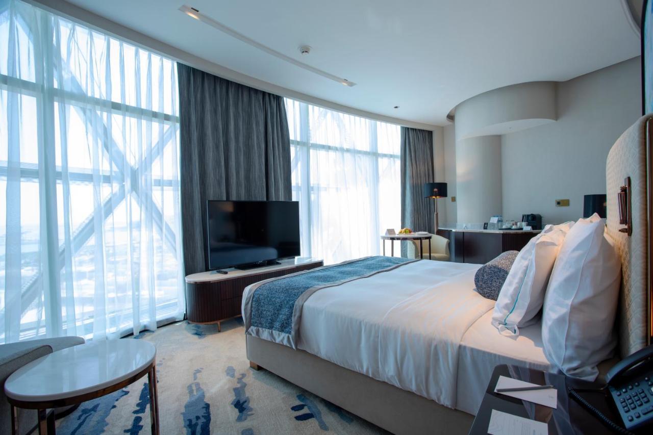 Century Marina Hotel - Lusail Kültér fotó A bedroom at the hotel