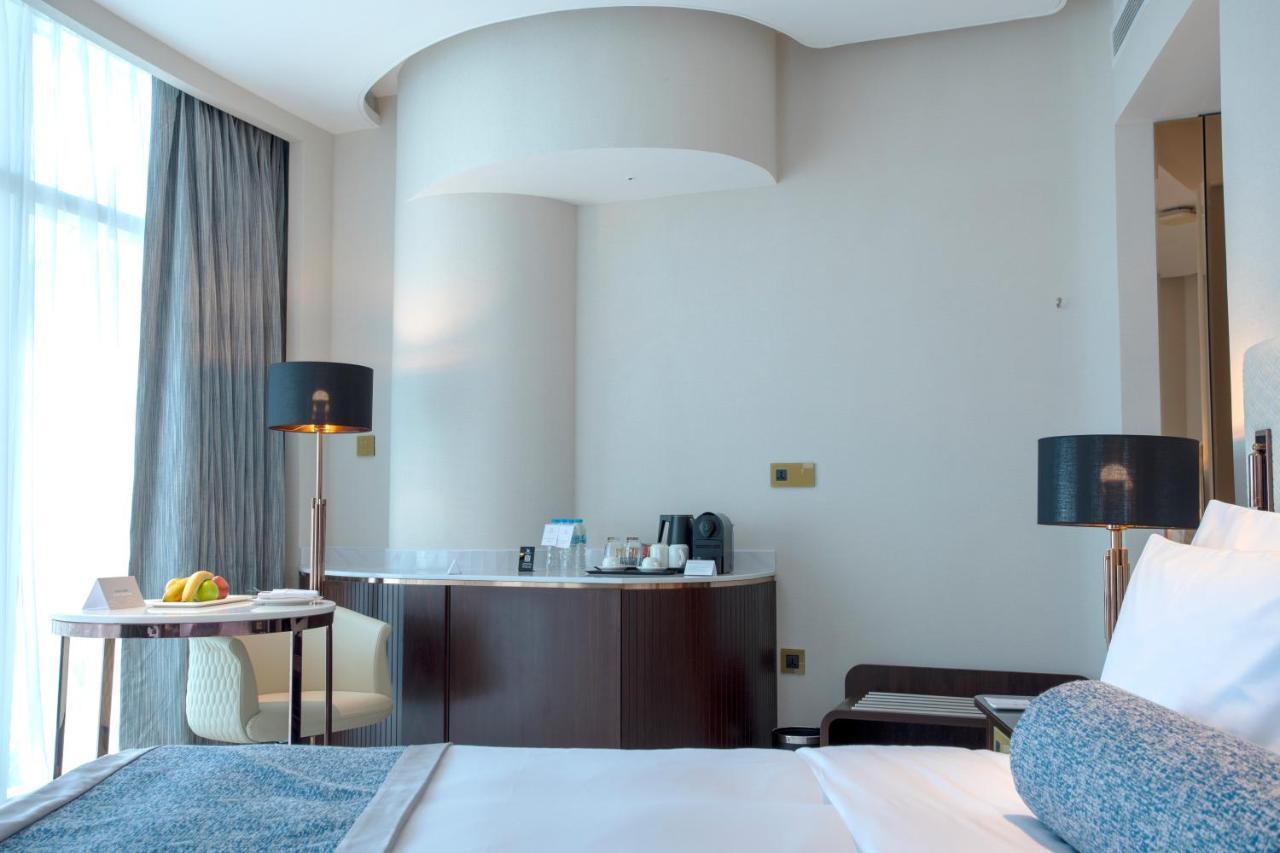 Century Marina Hotel - Lusail Kültér fotó A room at the hotel