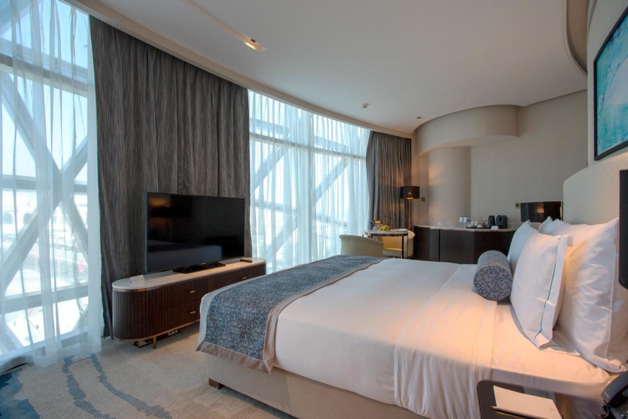 Century Marina Hotel - Lusail Kültér fotó A bedroom at the hotel
