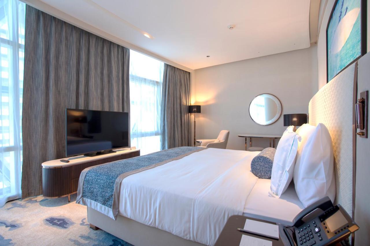 Century Marina Hotel - Lusail Kültér fotó A bedroom at the hotel