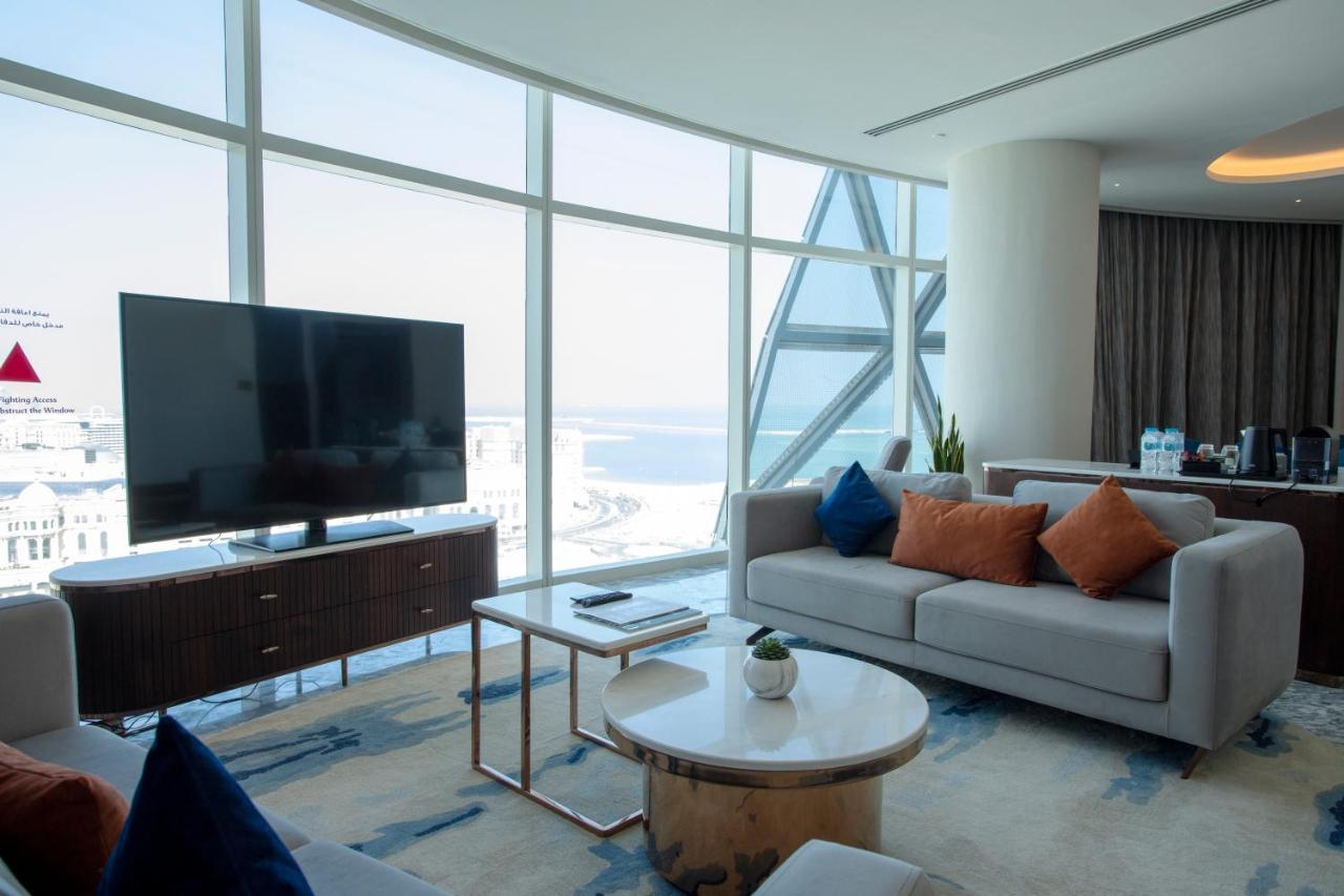 Century Marina Hotel - Lusail Kültér fotó A living room in a suite at the hotel