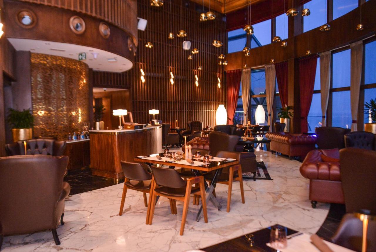 Century Marina Hotel - Lusail Kültér fotó The restaurant